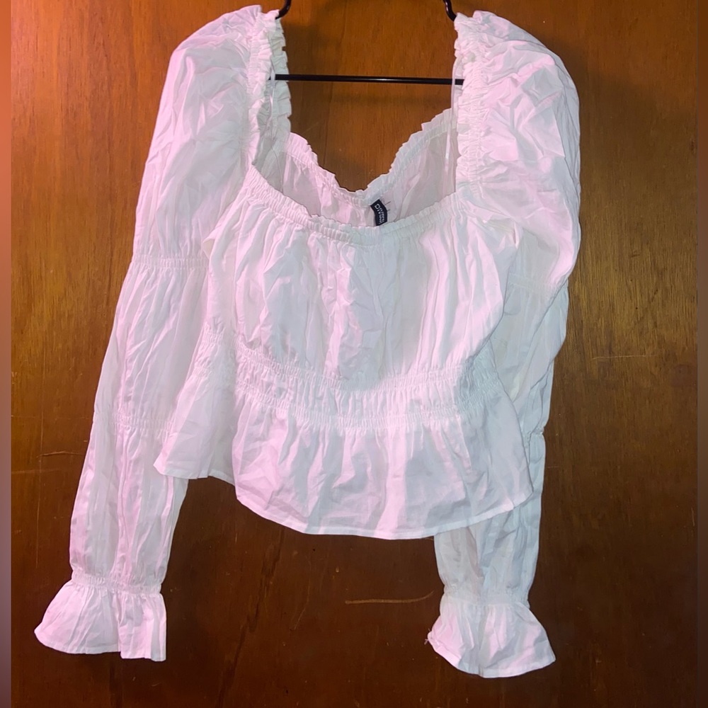 White, long-sleeved, H&M top.